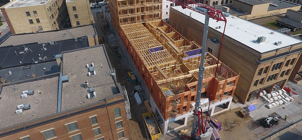 Dietrich Construction discovers Potain Hup 40-30 self-erecting crane provides greater productivity on downtown Fargo jobsites.